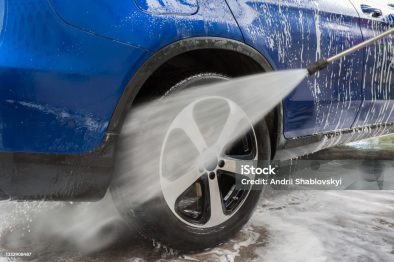Car Washing. Cleaning Car Using High Pressure Water. Autowashing outdoors
